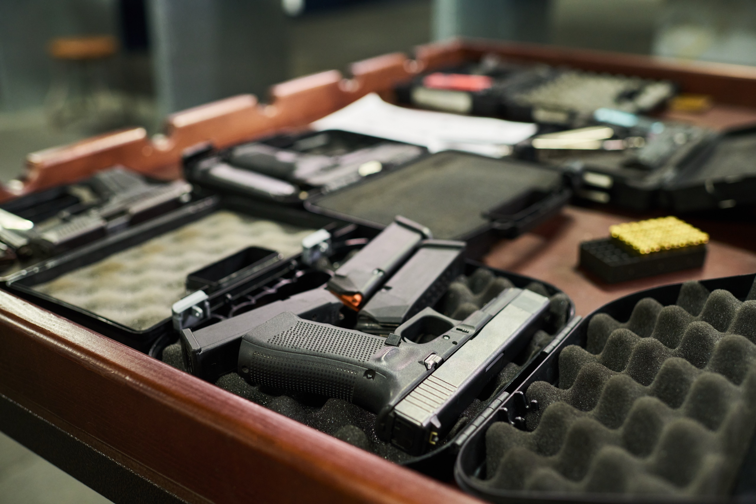Organized firearms and ammunition ready for secure storage